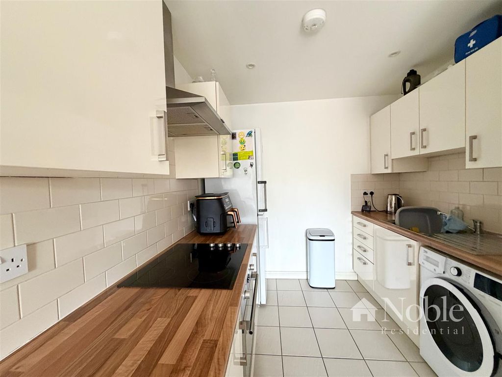 Property photo 2 of 13 Kitchen Area