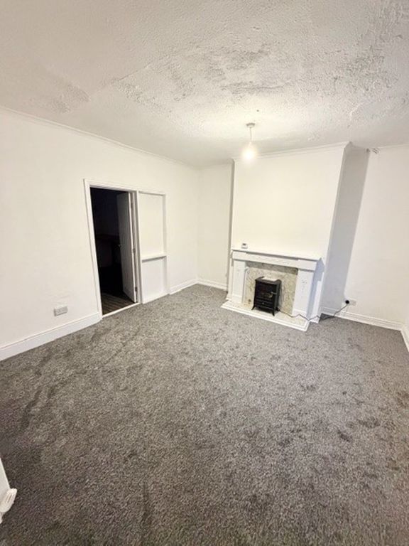 Property photo 3 of 9 Living Room