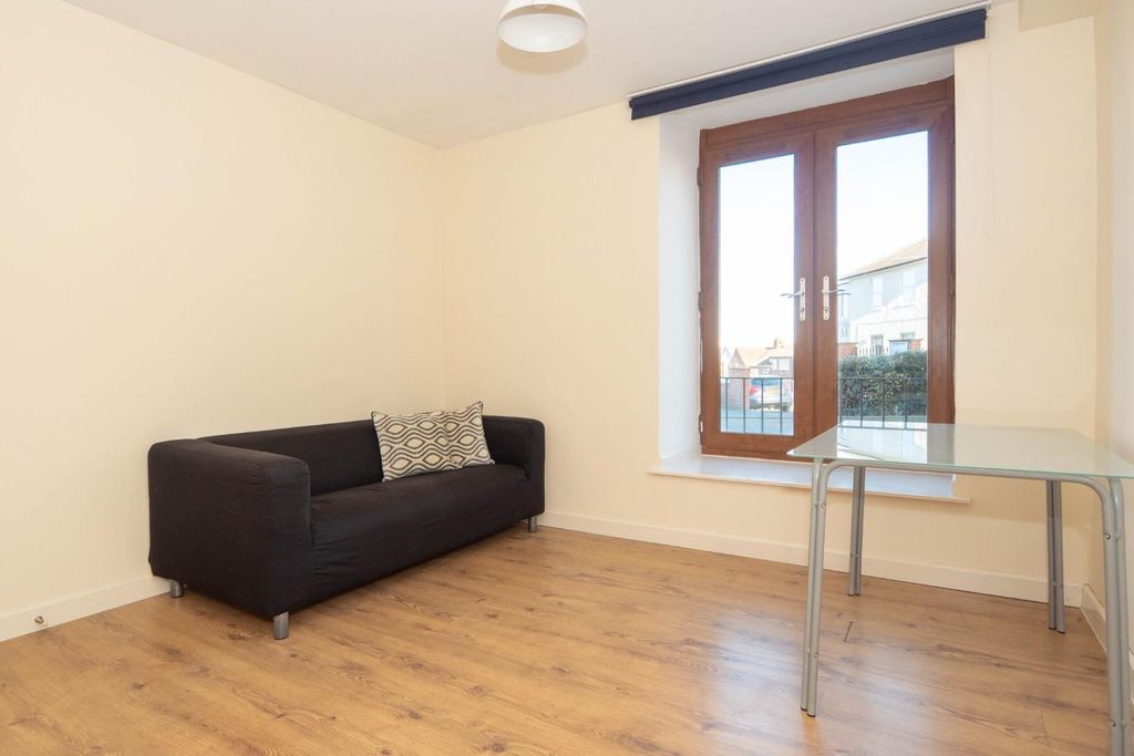 Property photo 3 of 12 Living Room