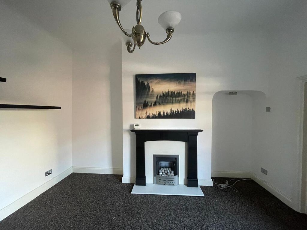 Property photo 3 of 12 Living Room