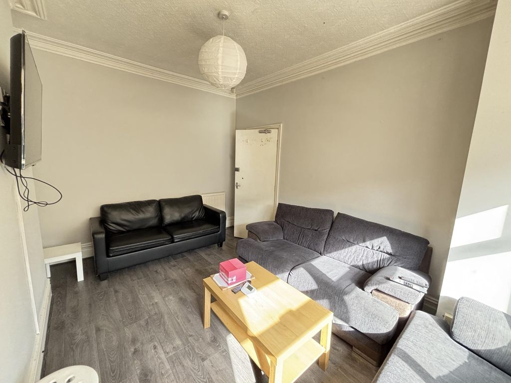 Property photo 2 of 14 A Bright, Modern Living Room Featuring Comfortable...