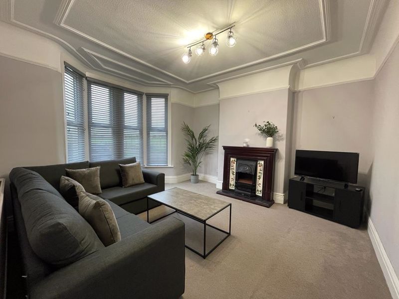 Property photo 3 of 12 Living Room