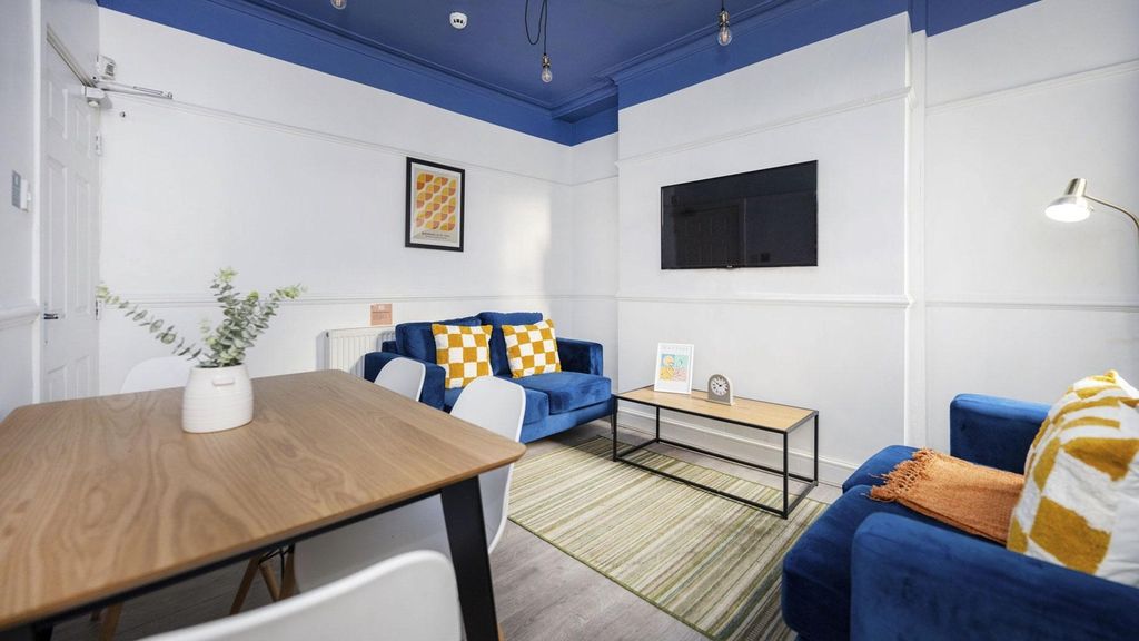 Property photo 1 of 24 A Spacious And Inviting Modern Living Room, Perfec...