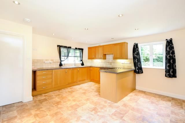 Property photo 3 of 8 Kitchen