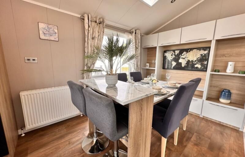 Property photo 2 of 8 Atlas Laburnum Lodge Dining Area At Hoburne Cotswold Reach Holiday Park