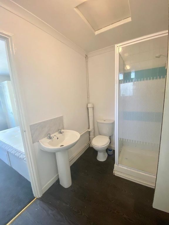Property photo 3 of 5 Bright Bathroom With Modern Shower And Sink....