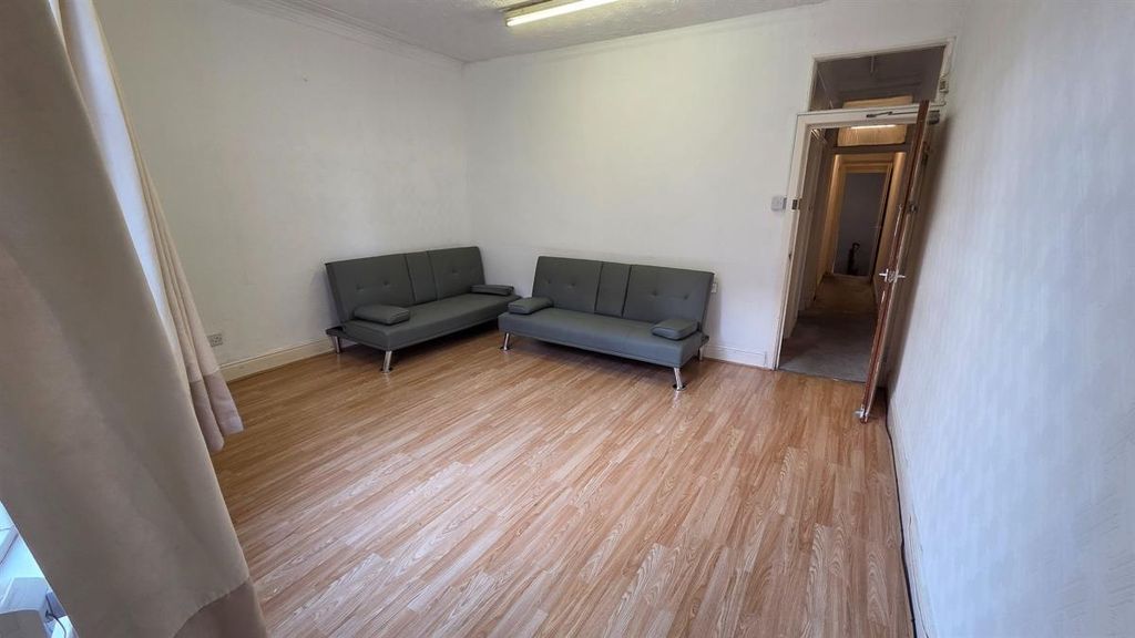 Property photo 3 of 13 A Spacious And Well-Lit Contemporary Living Room W...