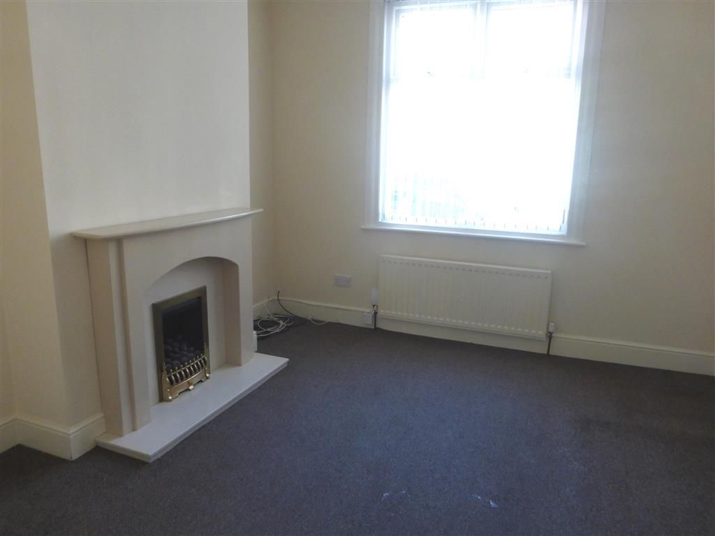 Property photo 1 of 8 Living Room