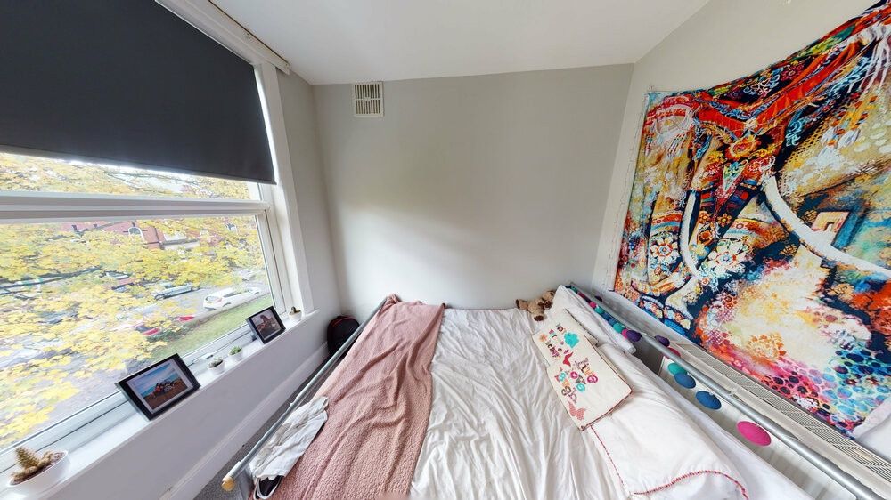 Property photo 1 of 10 A Spacious And Well-Lit Master Bedroom Featuring A...