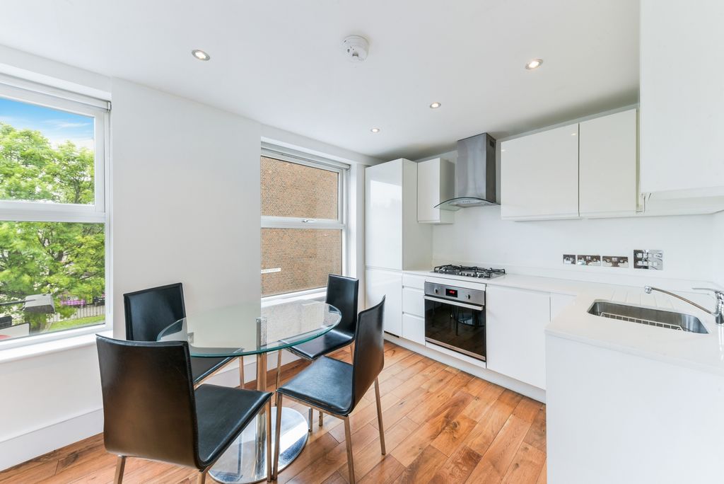 Property photo 3 of 8 Living Area - Comro