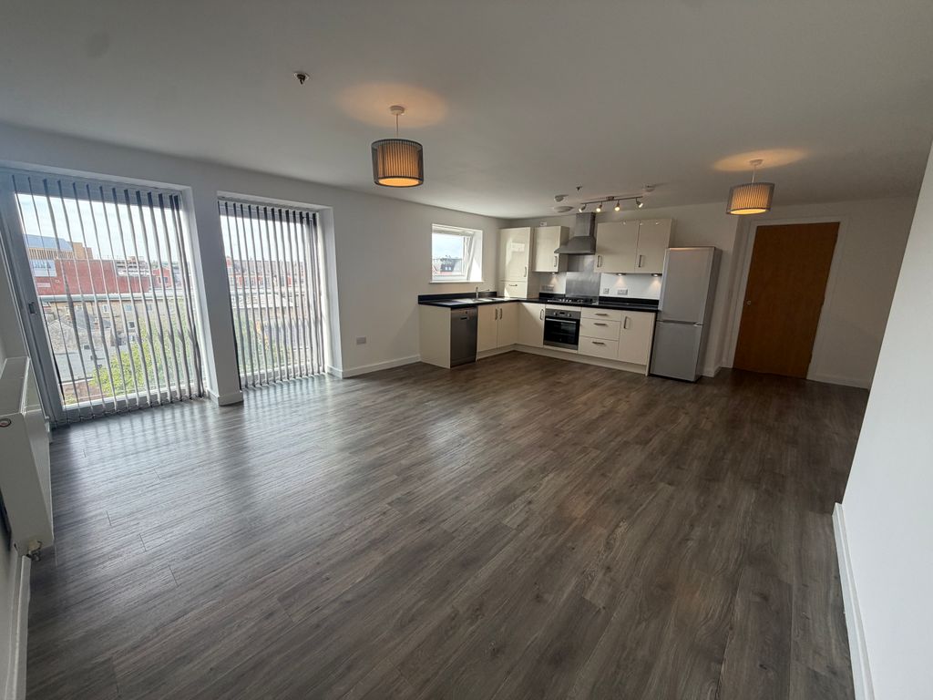 Property photo 2 of 9 Kitchen / Living Area