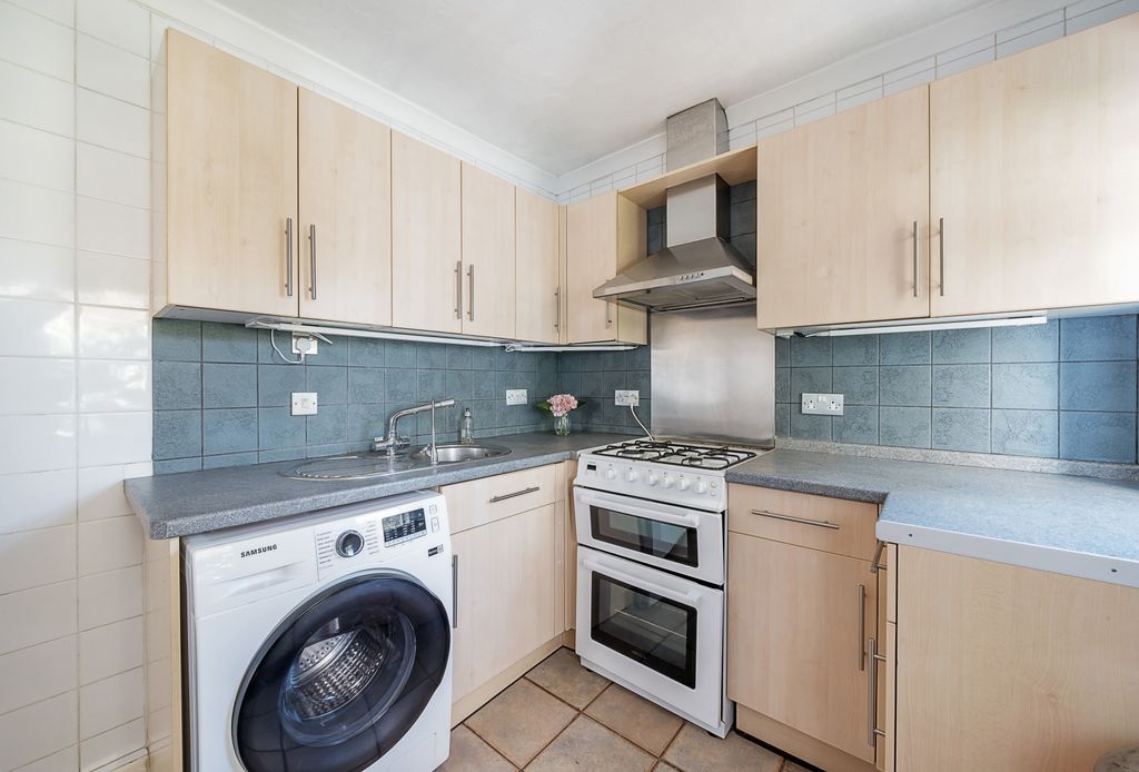 Property photo 3 of 12 Kitchen