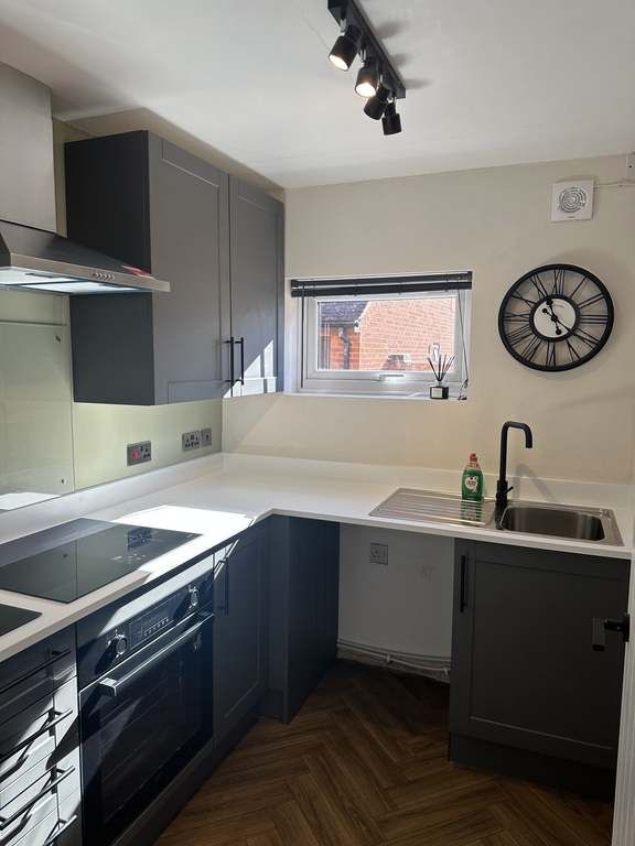 Property photo 3 of 12 Kitchen