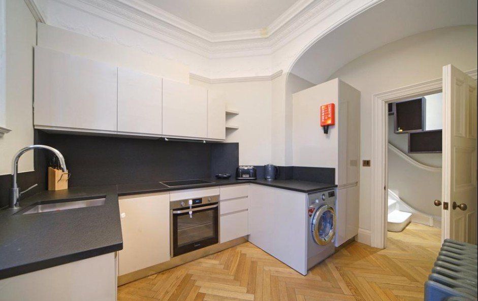 Property photo 2 of 8 Kitchen