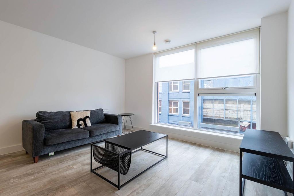 Property photo 3 of 13 Living Area