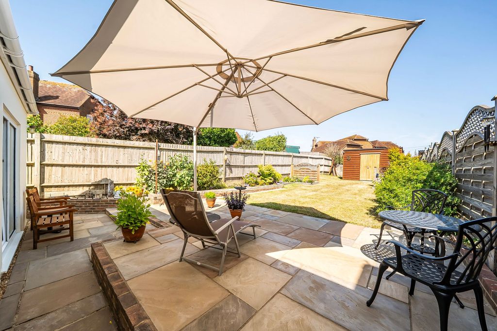 Property photo 3 of 11 Patio & Rear Garden