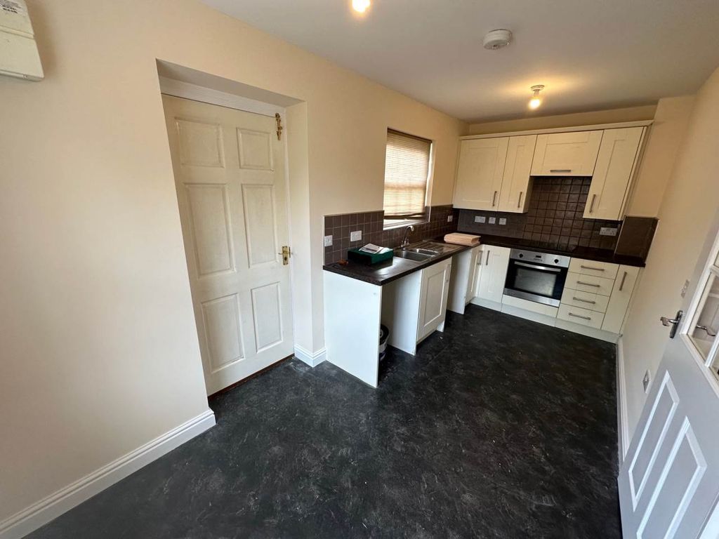 Property photo 2 of 11 Kitchen And Dining Area