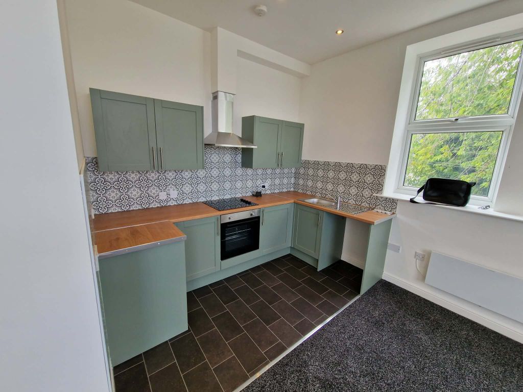 Property photo 3 of 10 Kitchen