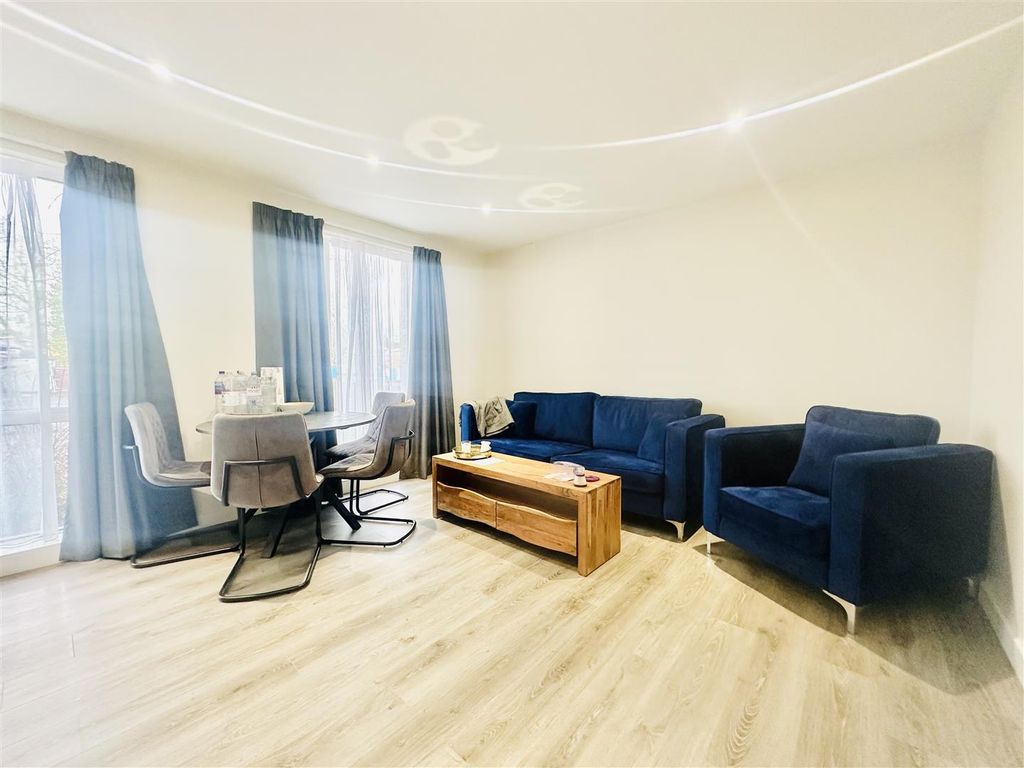 Property photo 2 of 12 Living Area