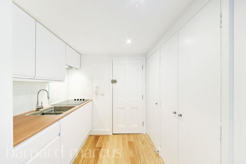 Property photo 3 of 8 Kitchen