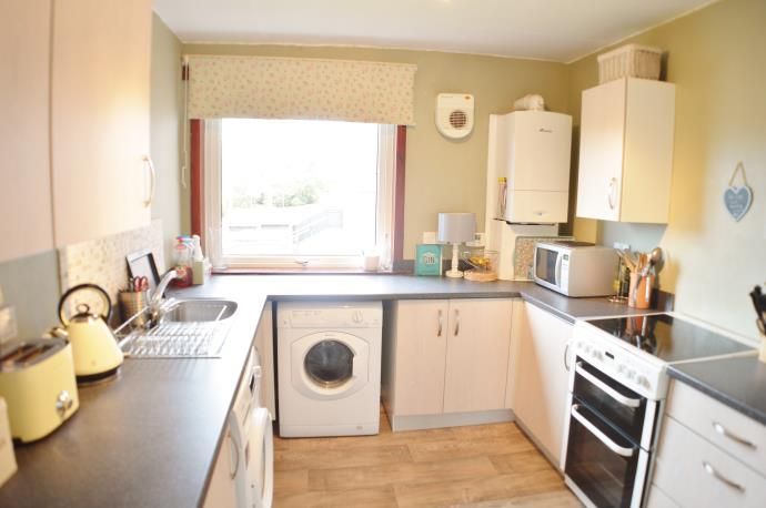 Property photo 3 of 8 Kitchen