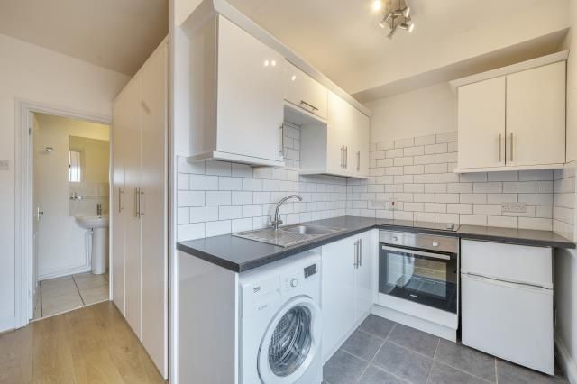 Property photo 1 of 7 Kitchen