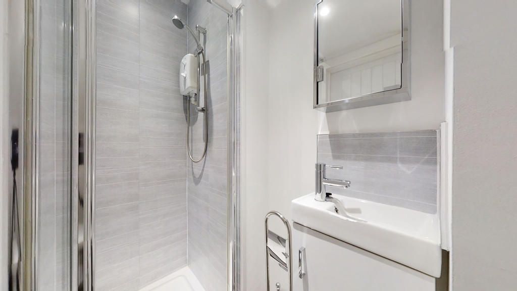 Property photo 3 of 10 A Modern Bathroom Suite Featuring A Sleek Walk-In ...