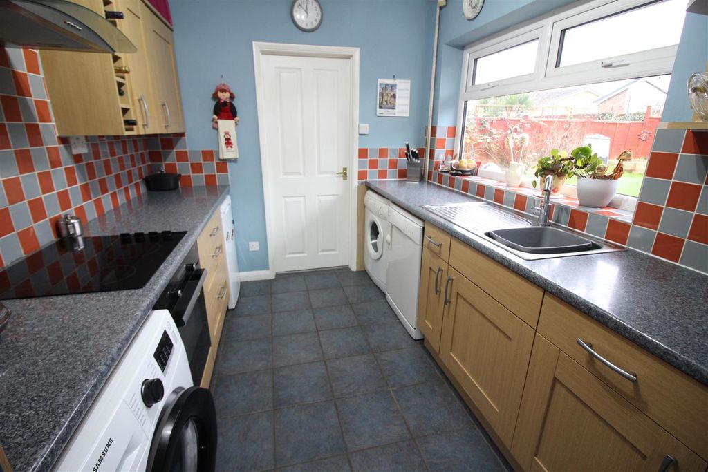 Property photo 2 of 12 Kitchen