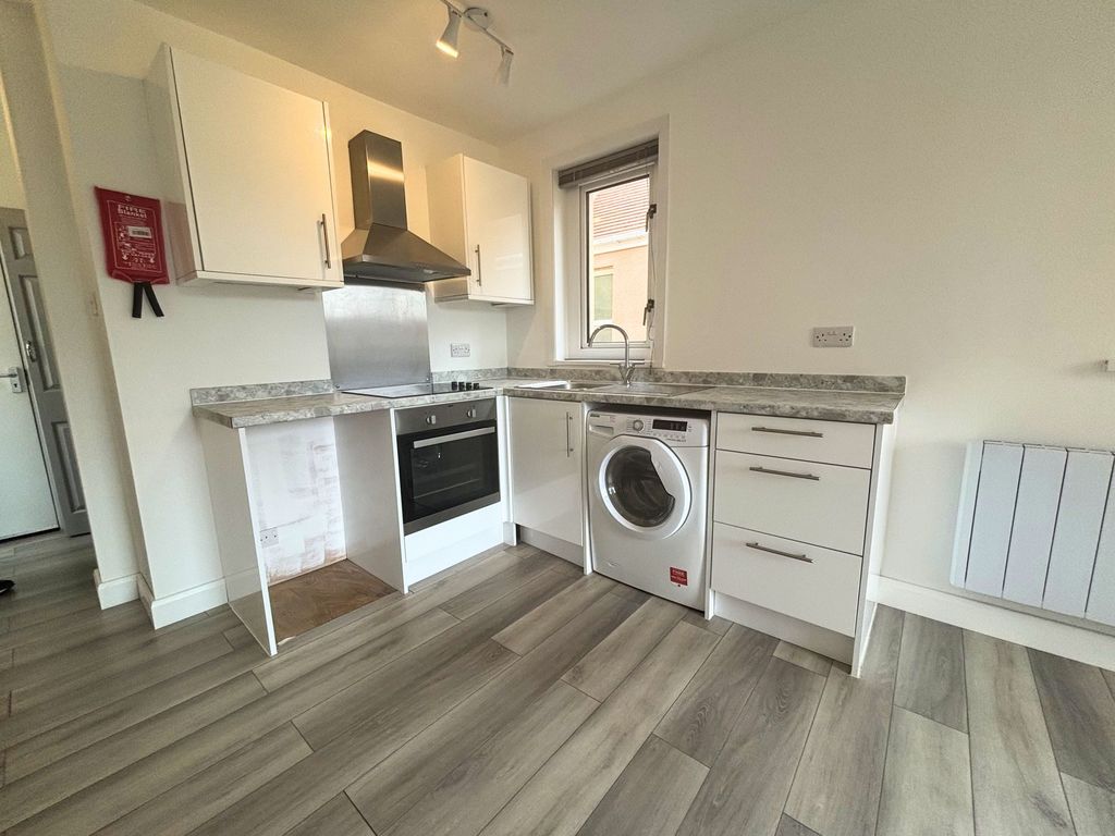 Property photo 2 of 6 Kitchen Area
