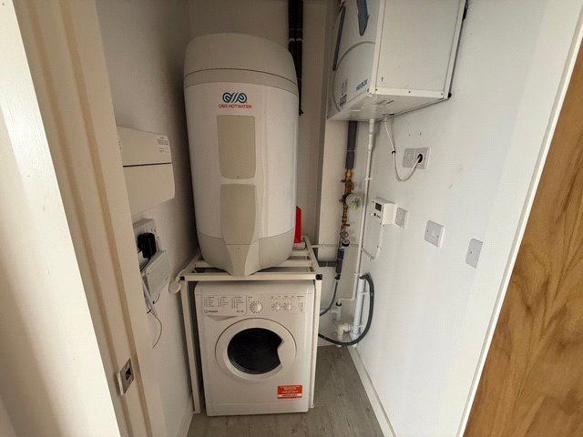 Property photo 3 of 8 Utility Room