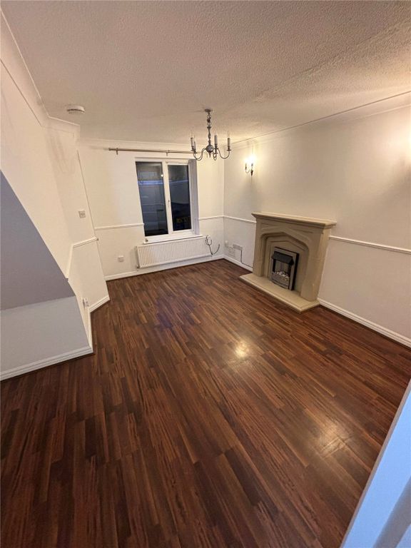 Property photo 2 of 12 Living Area