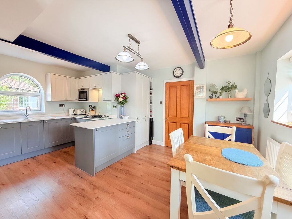 Property photo 3 of 17 Dining Kitchen