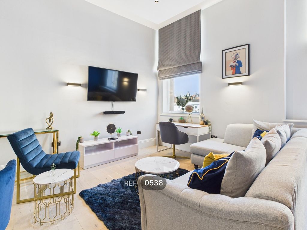 Property photo 3 of 21 Kitchen & Living Area