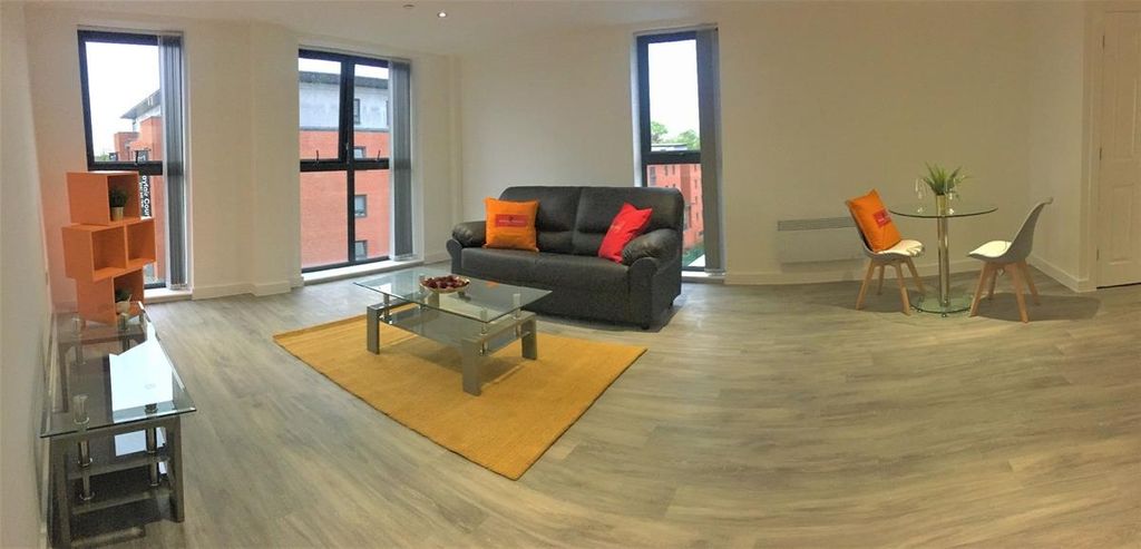 Property photo 2 of 5 Spacious And Modern Living Room With Large Windows...