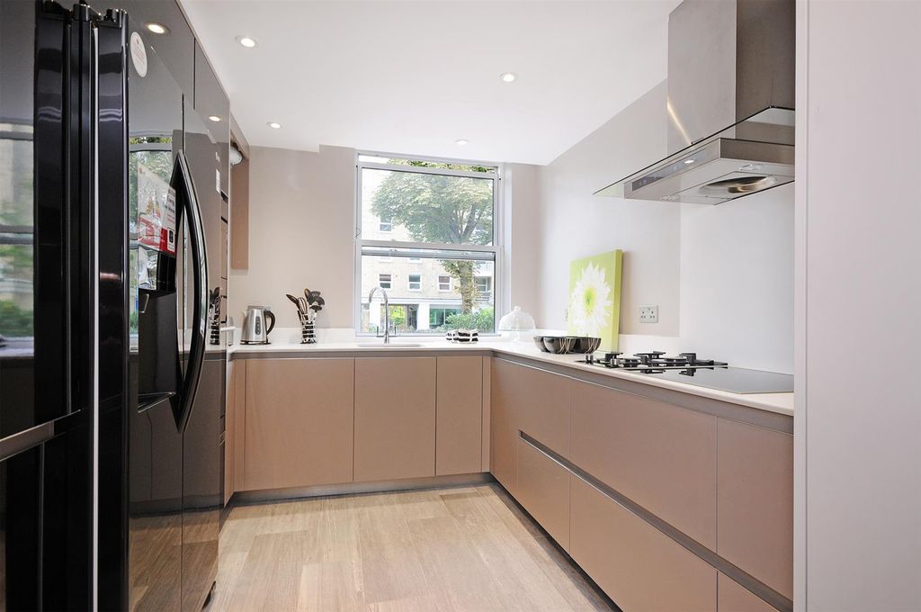 Property photo 3 of 21 1 CC Kitchen.Jpg