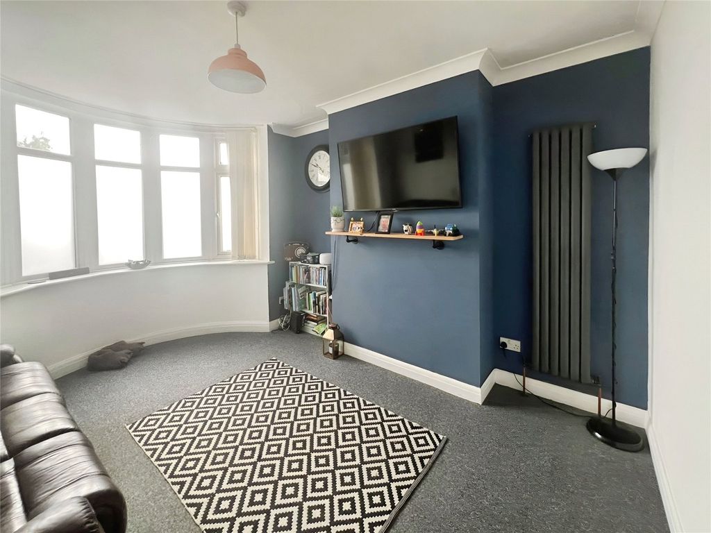 Property photo 3 of 17 Front Living Room