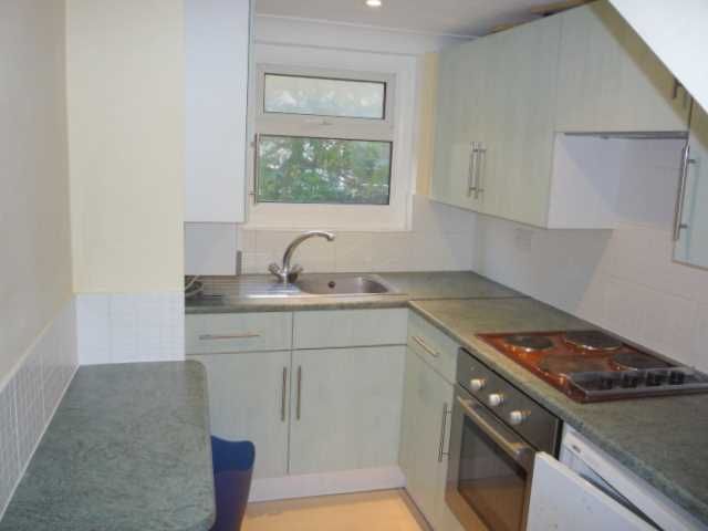 Property photo 3 of 7 Kitchen