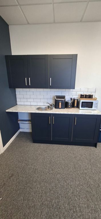 Property photo 3 of 10 Kitchen Area