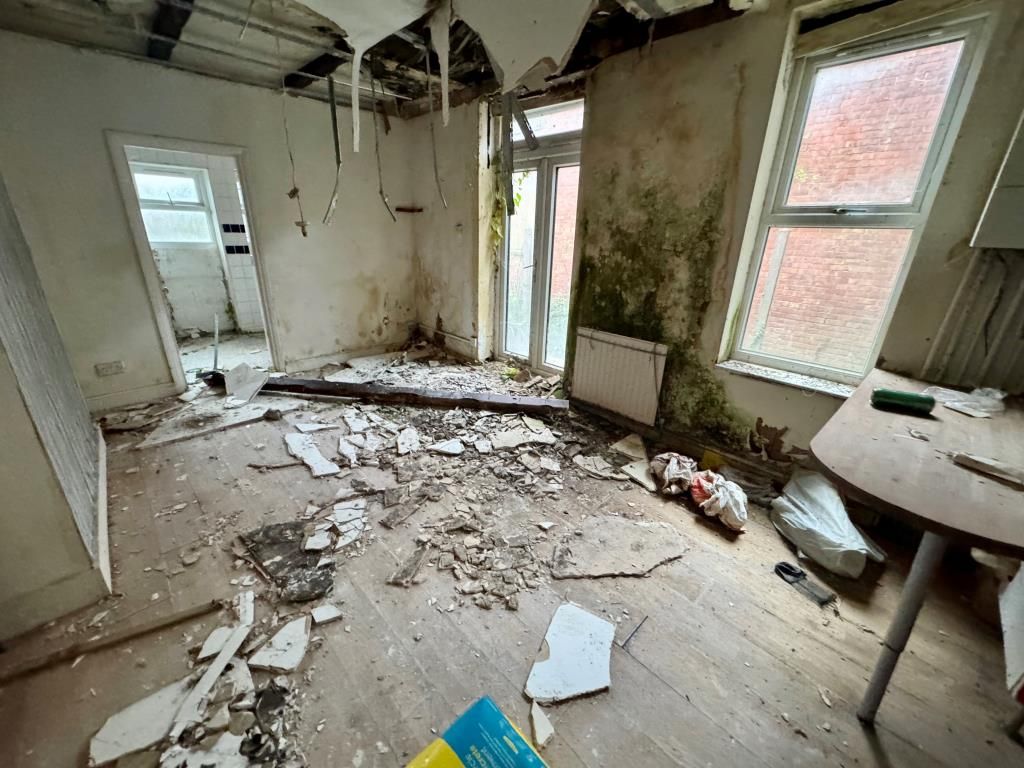 Property photo 3 of 7 Living Room Area