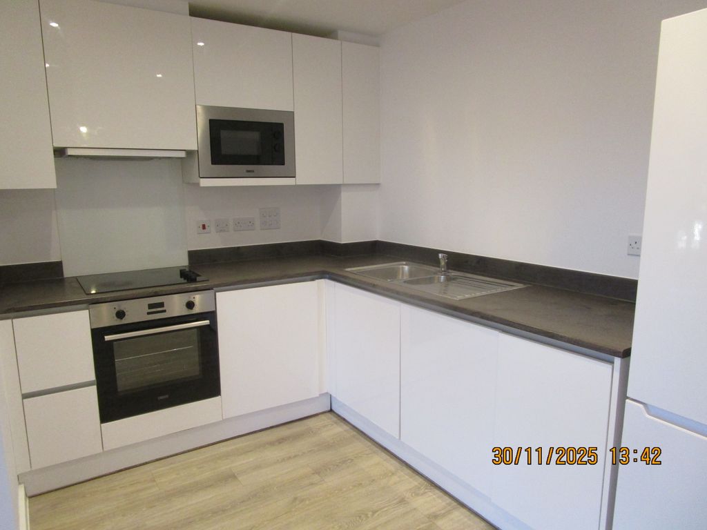 Property photo 3 of 14 Stylish Kitchen