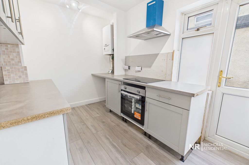 Property photo 3 of 13 Kitchen Area