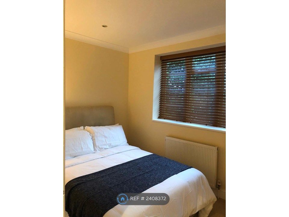 Property photo 3 of 15 Second Bedroom With Full Length Window And View