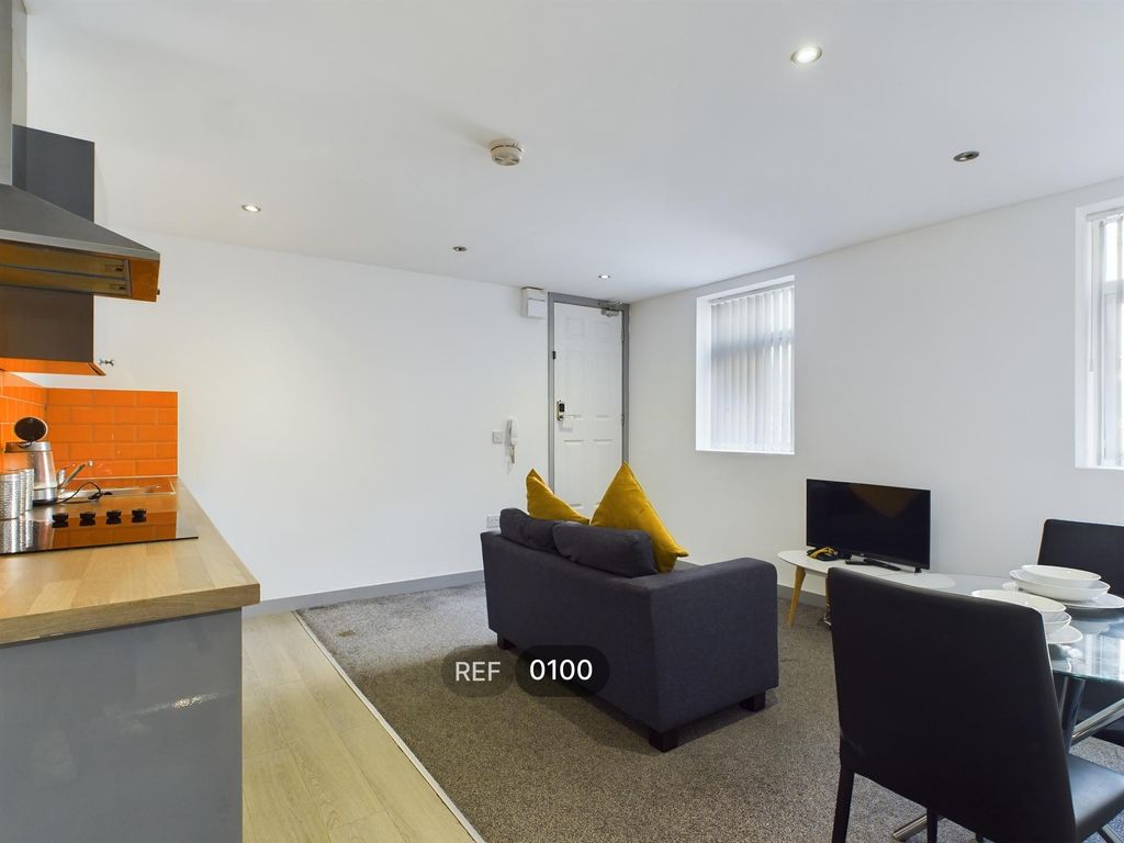 Property photo 3 of 7 Kitchen & Living Area