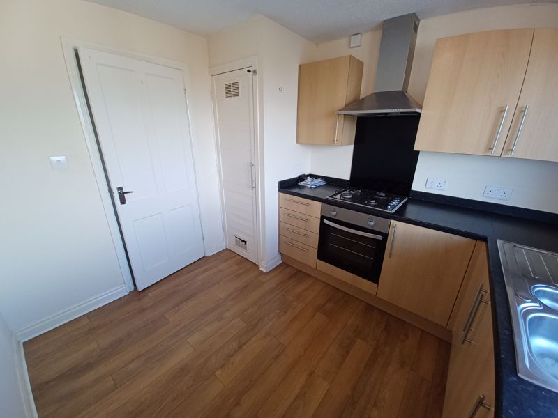 Property photo 3 of 12 Kitchen