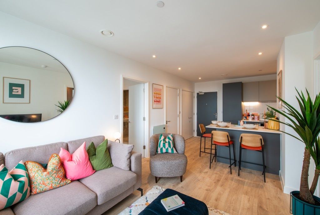 Property photo 1 of 12 Bright And Modern Living Room With Stylish Grey So...