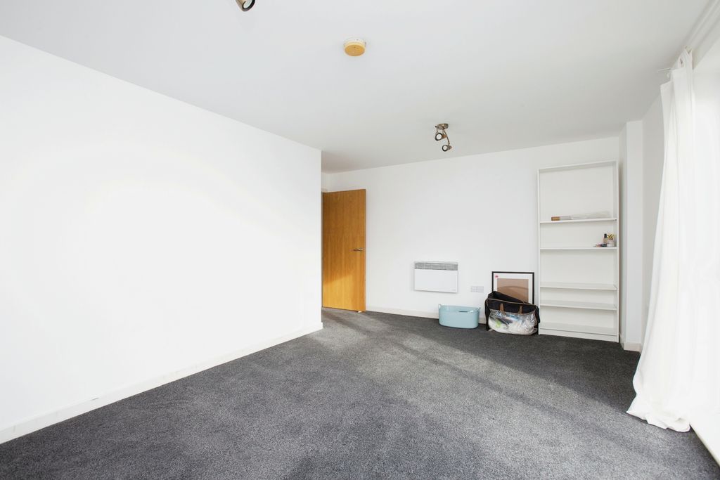 Property photo 2 of 10 Living Area