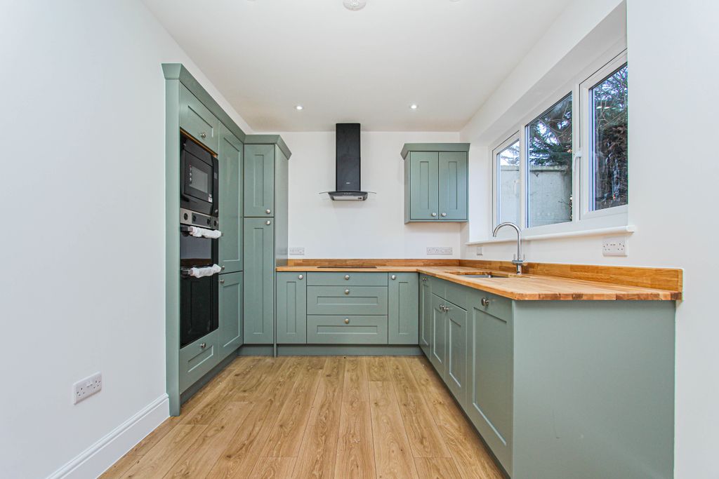 Property photo 3 of 12 Kitchen Area