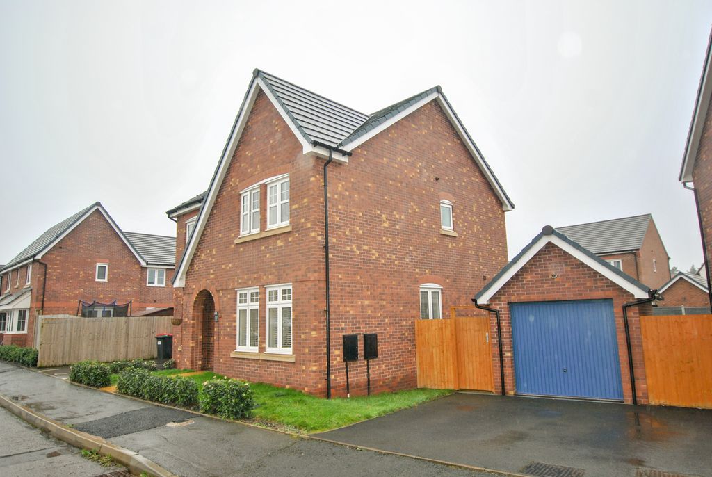 Property photo 2 of 25 Front With Garage