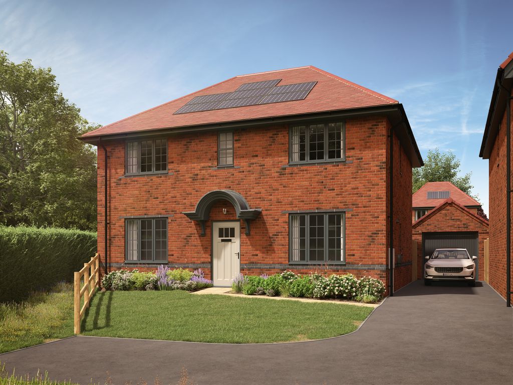 Property photo 1 of 10 A Red Brick House With Solar Panels On Its Roof Sits In The Foreground