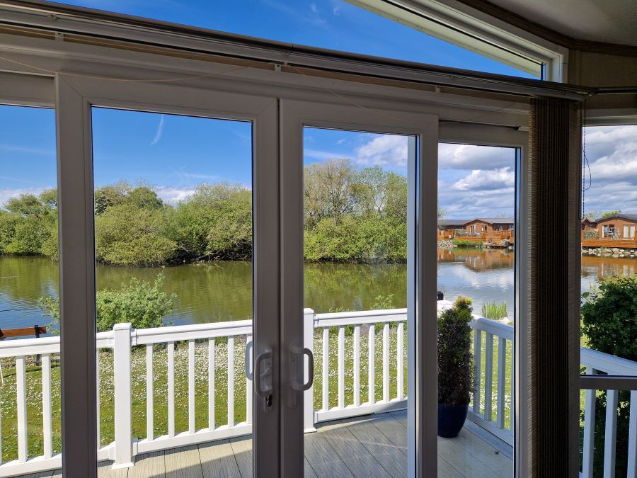Property photo 3 of 18 Lakeside View Through The Lodge's Patio Doors